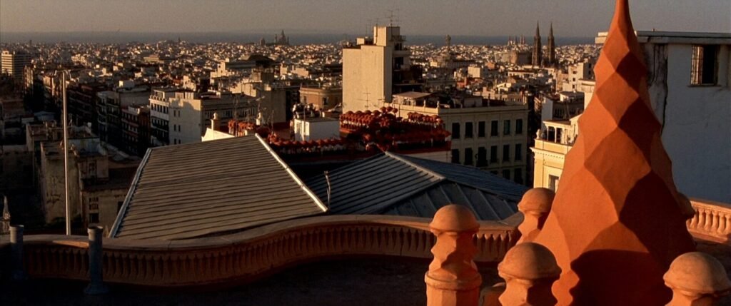 Barcelona rooftops at golden hour seen from a high terrace